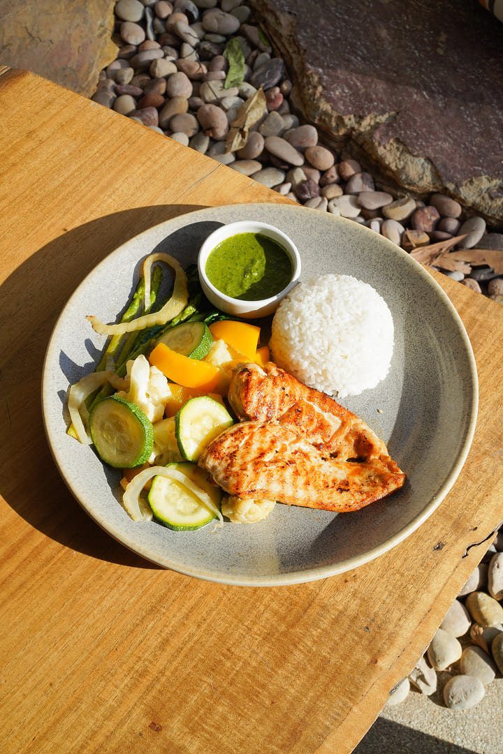 Grilled chicken with seasonal vegetables served at Maji Kitchen